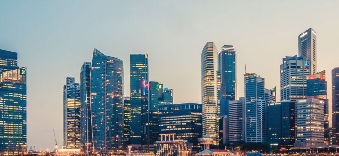 singapore-skyline-at-night-next-to-water